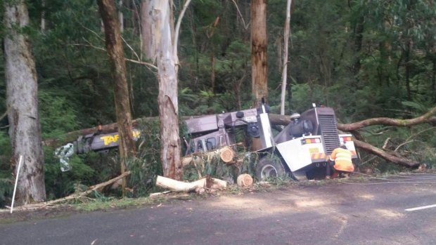 A crane fell down a gully in the Dandenongs because of the rainy weather and wet roads on Wednesday