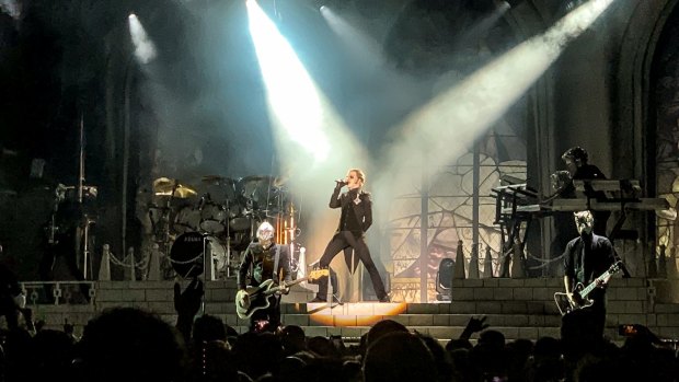Ghost put on an over-the-top performance of pop metal at the Download Festival in Sydney.