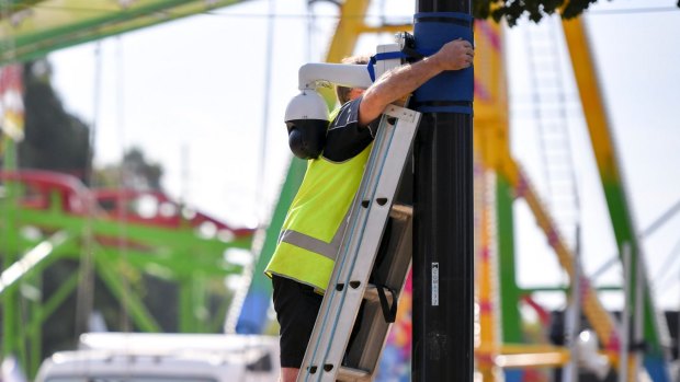 Workers installed extra CCTV cameras near the fun rides at this year's Moomba festival.