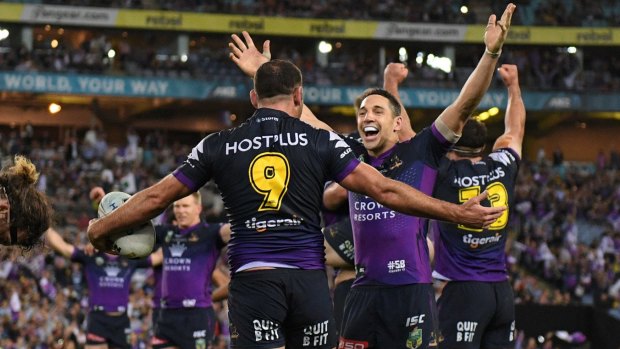 Three becomes two: Billy Slater and Cam Smith react at full time.