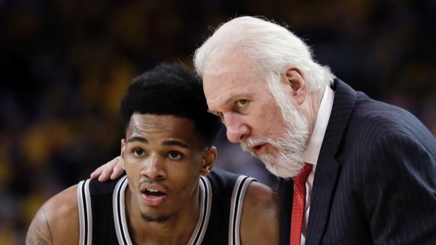 Spurs coach Gregg Popovich with guard Dejounte Murray during game 2 of the NBA western conference finals against Golden State.