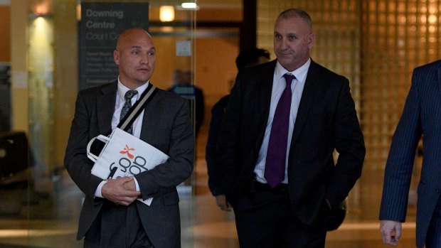 Bug out: Adrian Gard, (right) has pleaded not guilty to making up claims about finding a bug secreted in a chair in an All Blacks' meeting room.