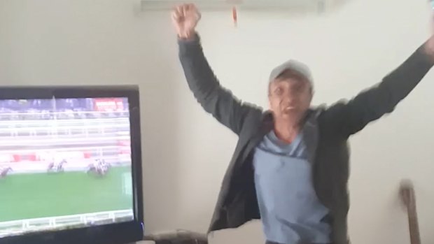 TAB punter Dominic celebrates his million-dollar win.