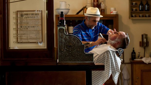 Barber Jack Papoutsidis shaving Ben Lane at Pickings & Parry Barbers in Fitzroy.