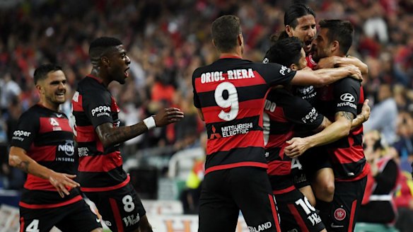 Derby dazzler: Brendan Hamill celebrates his low header that gave the Wanderers a 2-0 lead.