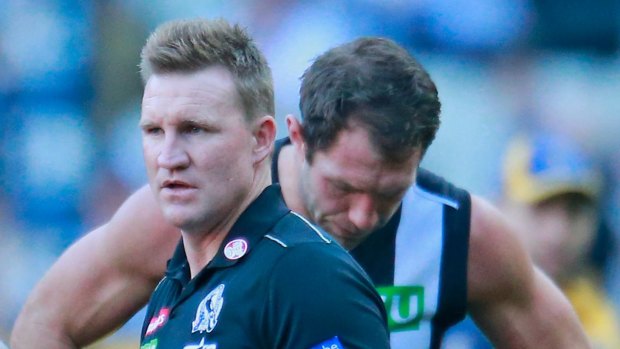 Under pressure: Nathan Buckley and his out-of-form forward Travis Cloke.