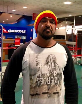 Alec Doomadgee wondered whether his t-shirt or beanie made him look dangerous on a Qantas flight from Brisbane to Mount Isa.