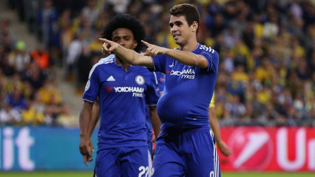 Oscar celebrates Chelsea's third goal.