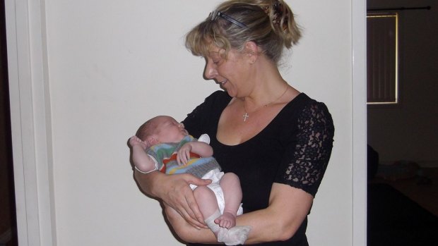 Sue Metcalfe with newborn grandson Jai.