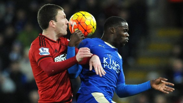 Foxes blow: Leicester's Jeffrey Schlupp, right, and West Bromwich Albion's Craig Gardner battle for the ball.