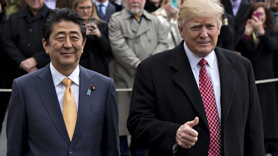 US President Donald Trump gives the thumbs up to his meeting with Japanese Prime Minister Shinzo Abe.