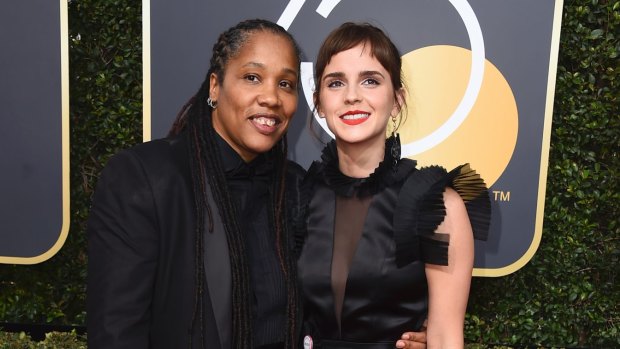 Marai Larasi, left, and Emma Watson arrive at the 75th annual Golden Globe Awards at the Beverly Hilton Hotel on Sunday, Jan. 7, 2018, in Beverly Hills, California.