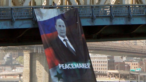 Russia is accused of flying its jets into Estonian and Finnish airspace. In a banner that mysteriously appeared on the Manhattan Bridge in New York last week, Russian President Vladimir Putin is depicted as a peacemaker.