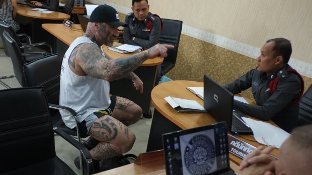 'I am not going anywhere': Tim Ward confronts police at the Pattaya Beach station, accusing them of planting drugs in his apartment.