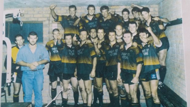 Proud: Brad Arthur (fifth from right, bottom row) with the Batemans Bay Tigers.