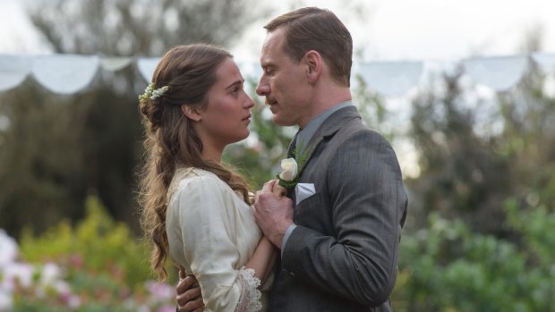 Michael Fassbender stars as Tom Sherbourne and Alicia Vikander as his wife Isabel in <i>The Light Between Oceans</i>, directed by Derek Cianfrance.