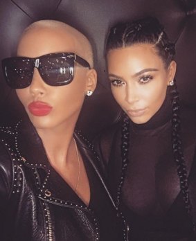 Enough is enough with the Kim Kardashian and Kanye West v Amber Rose and Wiz Khalifa feud, according to Kelly.