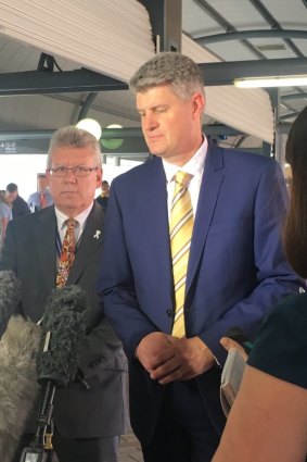 Queensland Rail acting chief executive officer Neil Scales and Transport Minister Stirling Hinchliffe.