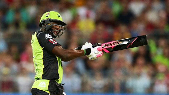 Integrity concern: Andre Russell of the Thunder wields the colourful bat against the Sixers at Spotless Stadium.