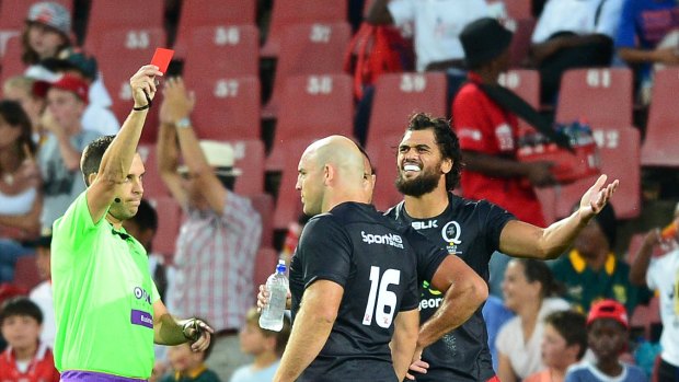 Seeing red: Karmichael Hunt and Stephen Moore react as referee Mike Fraser red cards Quade Cooper. 