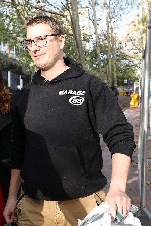 Chris Guillan leaves Sydney Police centre after being released on bail.