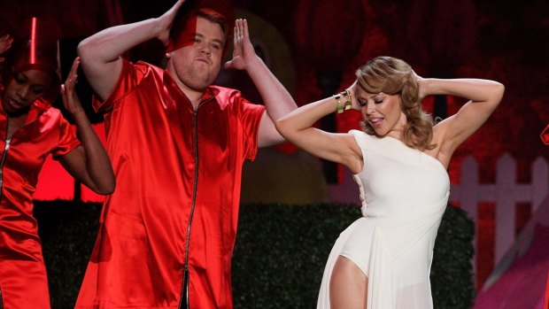 Old mates ... Corden and Minogue perform at the 2009 Brit Awards.