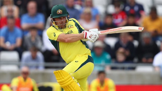 Aaron Finch adds to his 96-run stand with Steve Smith.