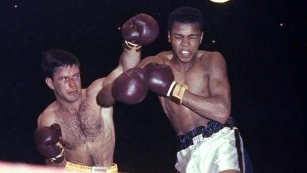 "Hard as nails": Tony Madigan fighting Cassius Clay, later Muhammad Ali, in 1959.