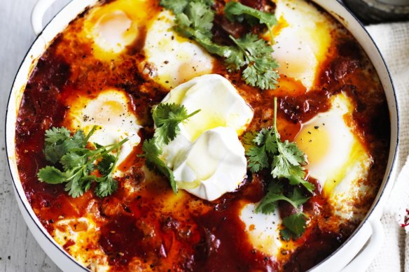 One-pot wonder: Baked eggs with chorizo sausage and cooling labna.