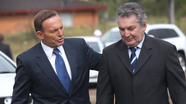Former Macarthur MP Russell Matheson (right) is pictured with Tony Abbott. 