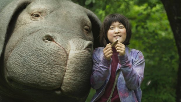 Ahn Seo-Hyun Ahn as Mija with Okja. 