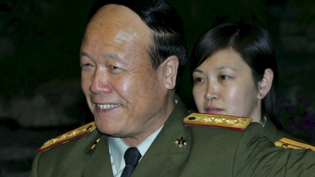 Then Chinese Vice Chairman of the Central Military Commission Guo Boxiong attends a meeting at the Diaoyutai State Guest House in Beijing in 2005.
