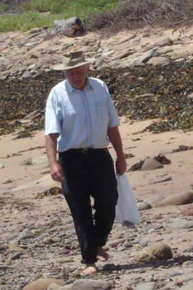 Natural historian: John Suter scouring a beach for treasure.