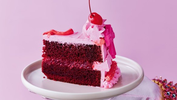 Red velvet layer cake with raspberry compote and buttercream icing.