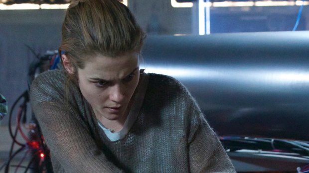 Rachael Taylor helps propel the action with a suitably taut performance in ARQ.