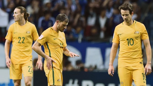 Lacklustre: It was a disappointing night for the Socceroos in Tokyo.
