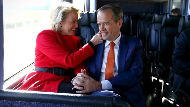 Makeover: Opposition Leader Bill Shorten and wife Chloe in the campaign bus in July last year.