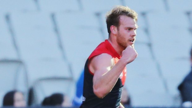Jack Watts celebrates kicking the sealer for the Dees.