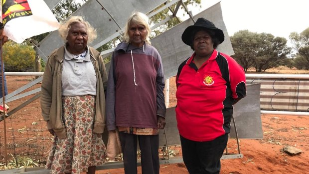 Shirley Wonyabong, Elizabeth Wonyabong, and Vicky Abdullah are protesting the development of uranium mines on their traditional lands.