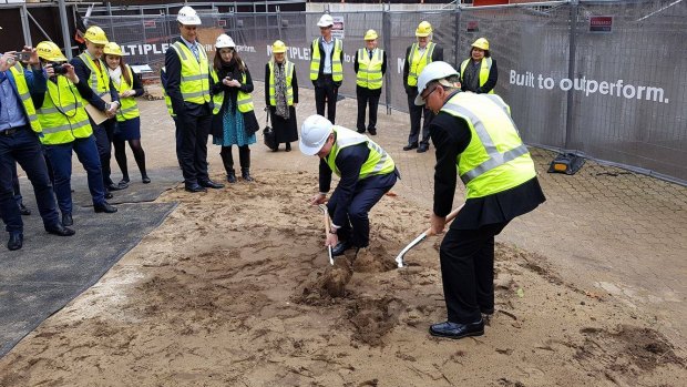 Mark McGowan and Arts Minister David Templeman turn the first sod of soil at the site of the new museum for WA.