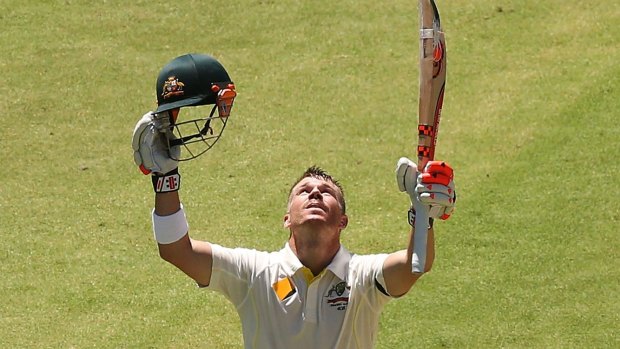 David Warner salutes the heavens in honour of fallen friend Phillip Hughes after scoring his 10th Test century.
