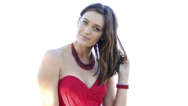 City girl: Tess Haubrich rejoins the Home and Away cast as  John Palmer's ''rude'' daughter Shandi.