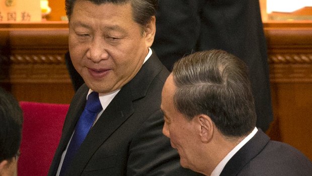 Chinese President Xi Jinping, left, with Politburo Standing Committee member Wang Qishan.