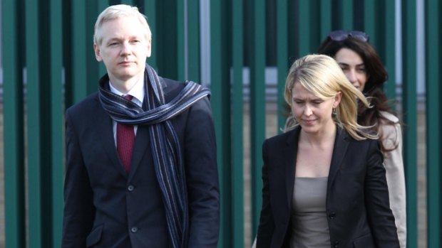 Jennifer Robinson, centre, with her client Julian Assange and friend Amal Clooney.