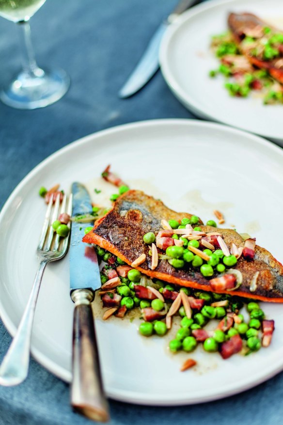 Pan-fried trout with braised peas from the <i>River Cottage Australia Cookbook</i>.