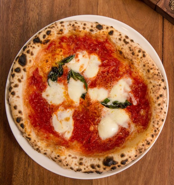 A puffy-crusted pizza from SPQR.