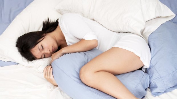 Why Sleep With a Pillow Between Your Legs?