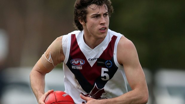 On the move: Andrew McGrath of Sandringham runs with the ball during the TAC Cup.