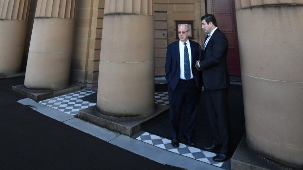 Eddie Obeid and his solicitor outside the Darlinghurst Supreme Court.