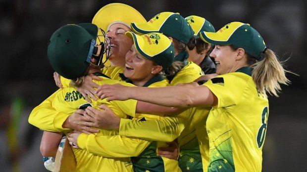 Breakthrough: Australia celebrate their win over England in the first Women's Ashes T20 match at North Sydney Oval.